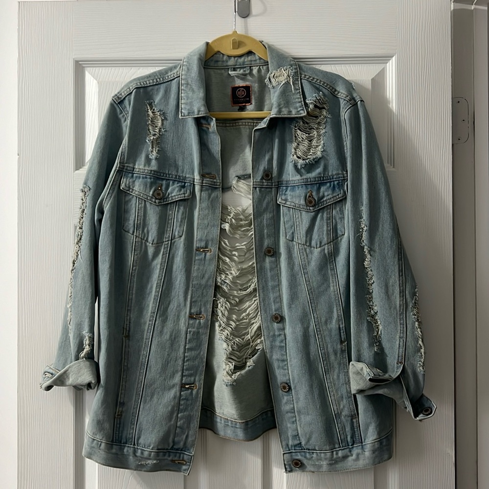 Distressed denim jacket